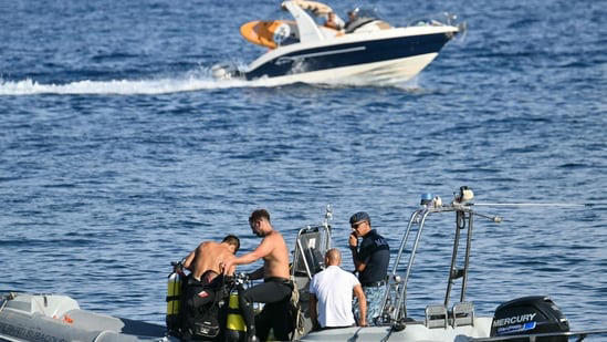 Italian marines (Marina Militare) prepare to dive off Porticello harbor near Palermo,. All the men missing after a luxury yacht sank off Sicily have been found, a coastguard official told.