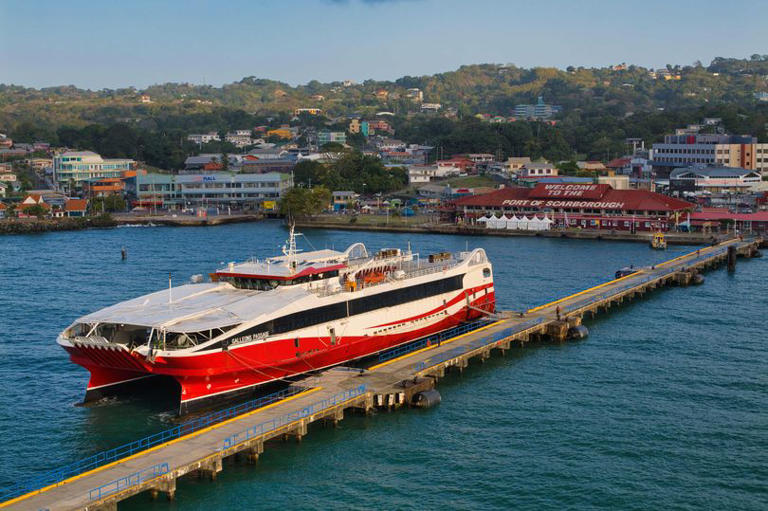 Galleons Passage catamaran moored at the Port of Scarborough in Trinidad in the Caribbean.