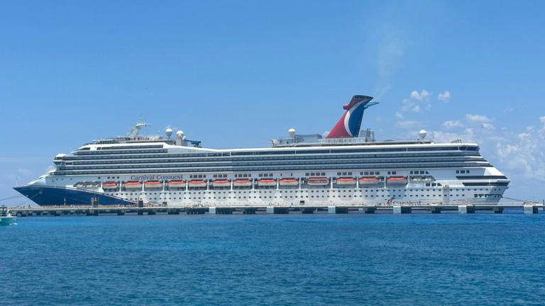 A Carnival Cruise Line ship is docked in Cozumel.