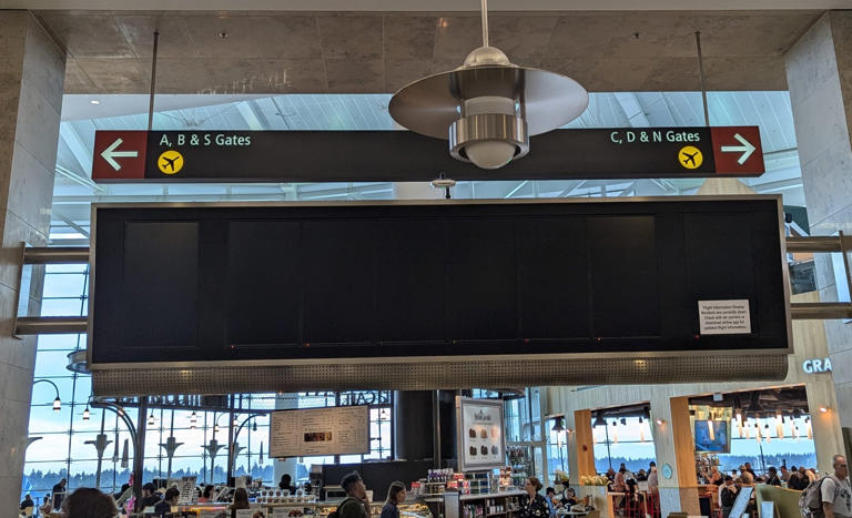 Some screens showing flight information are blacked out at Sea-Tac Airport as a result of a cyberattack. (Photo courtesy of David Niu )