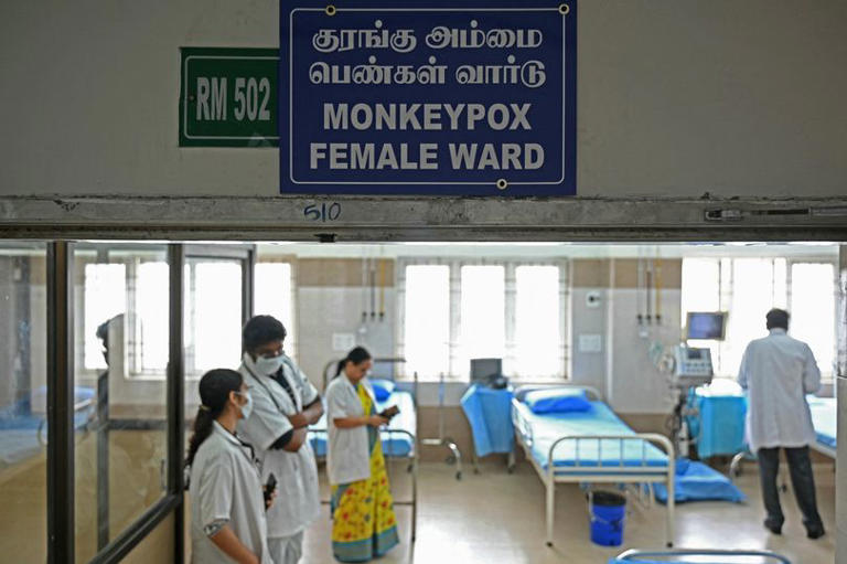 Doctors are pictured inside a newly mpox isolation female ward at a government hospital in Chennai