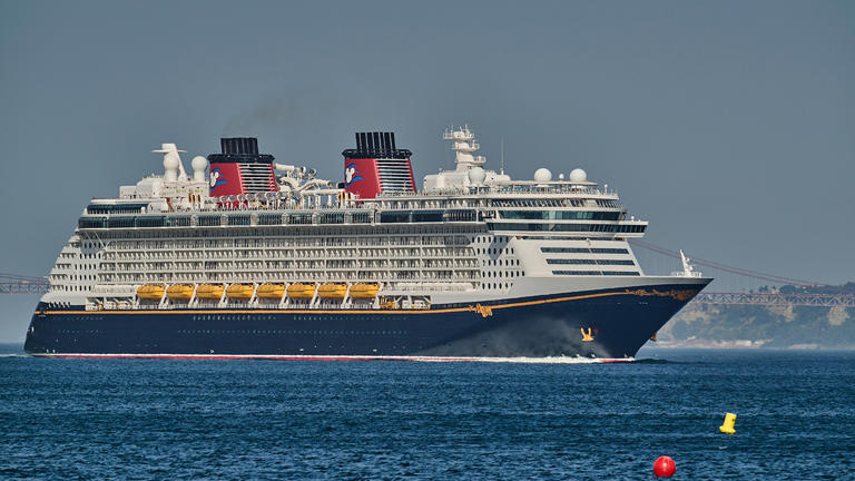 Disney Dream sails the Tagus River after leaving Lisbon cruise terminal on July 18, 2023, in Oeiras, Portugal. Getty Images