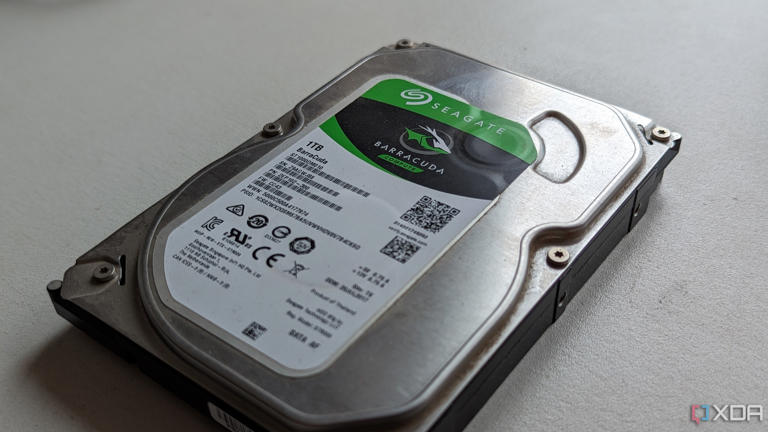 A 1TB Seagate Barracuda HDD on a white surface