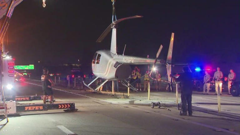 Helicopter landing on Los Angeles freeway shuts down traffic