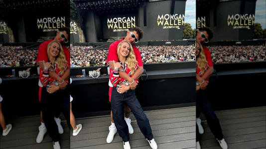 Patrick and Brittany Mahomes posing together at a Morgan Wallen concert