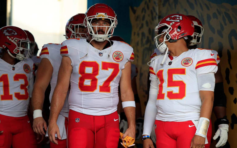 Kansas City Chiefs tight end Travis Kelce (87) looks on next to quarterback Patrick Mahomes (15) before a preseason NFL football game Saturday, Aug. 10, 2024 at EverBank Stadium in Jacksonville, Fla. The Jacksonville Jaguars defeated the Kansas City Chiefs 26-13. [Corey Perrine/Florida Times-Union]