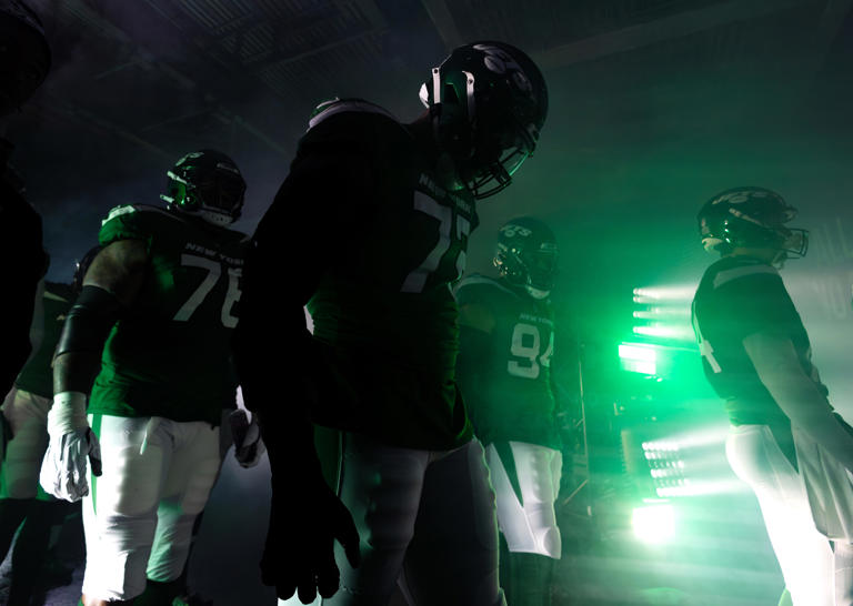 EAST RUTHERFORD, NEW JERSEY - DECEMBER 03: Micheal Clemons #72 of the New York Jets waits in the tunnel before the game against the Atlanta falcons during their game at MetLife Stadium on December 03, 2023 in East Rutherford, New Jersey. (Photo by Al Bello/Getty Images)