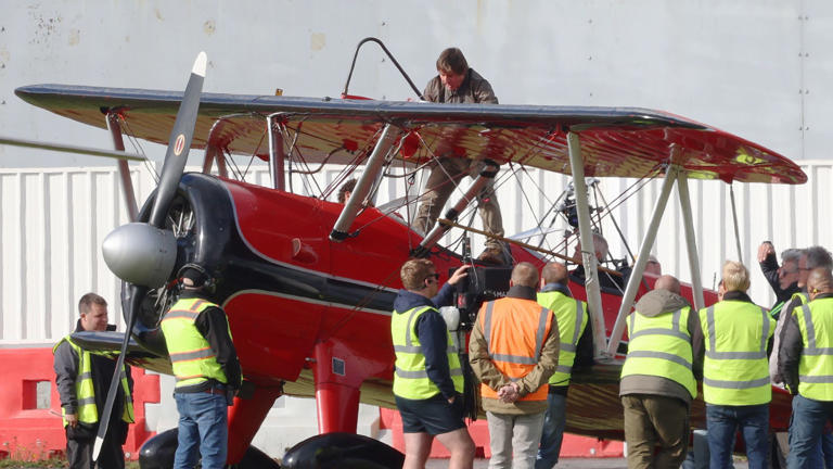 EXCLUSIVE: Hollywood daredevil Tom Cruise was spotted soaring through the skies of Oxfordshire, as he filmed the heart-pounding final scenes for his upcoming blockbuster "Mission: Impossible - Dead Reckoning Part Two". In a jaw-dropping spectacle that has left locals stunned, Cruise, 61, took to the skies in a vintage biplane, engaging in a thrilling aerial dogfight!  Pictured: tom cruise Ref: BLU_S7914022 150924 EXCLUSIVE Picture by: Dean / Click News / SplashNews.com  Splash News and Pictures USA: 310-525-5808  UK: 020 8126 1009 eamteam@shutterstock.com  World Rights, No France Rights, No Ukraine Rights, No Romania Rights, No Portugal Rights, No Spain Rights, No Turkey Rights, No Croatia Rights, No Serbia Rights, No Czech Republic Rights, No Bulgaria Rights