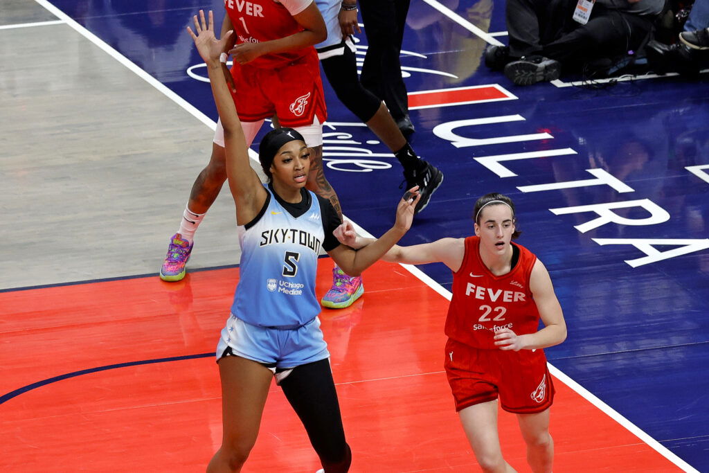 INDIANAPOLIS, IN – JUNE 01: Chicago Sky forward Angel Reese (5) is guarded by Indiana Fever guard Caitlin Clark (22) on June 1, 2024, at Gainbridge Fieldhouse in Indianapolis, Indiana. (Photo by Brian Spurlock/Icon Sportswire via Getty Images)