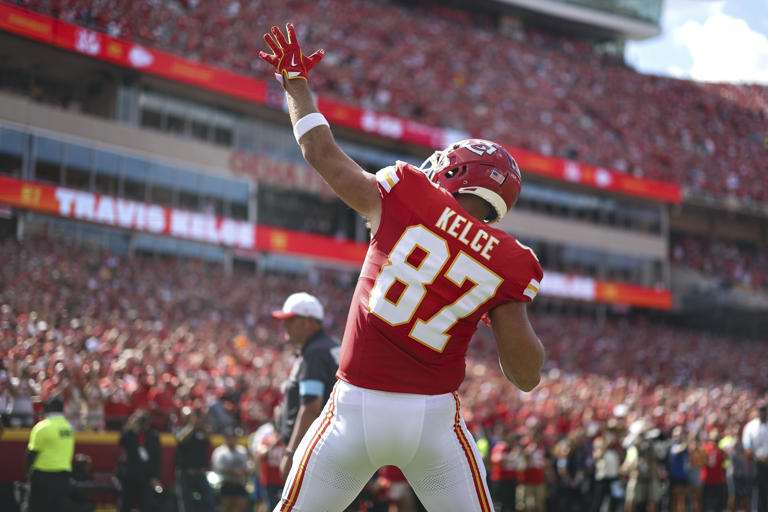 Travis Kelce #87 of the Kansas City Chiefs runs onto the field prior to an NFL football game against the Cincinnati Bengals at GEHA Field at Arrowhead Stadium on September 15, 2024 in Kansas City, Missouri. Before facing the Bengals, the Super Bowl champ clinched a win against the Ravens, making his young fan's day even brighter. Kevin Sabitus/Getty Images