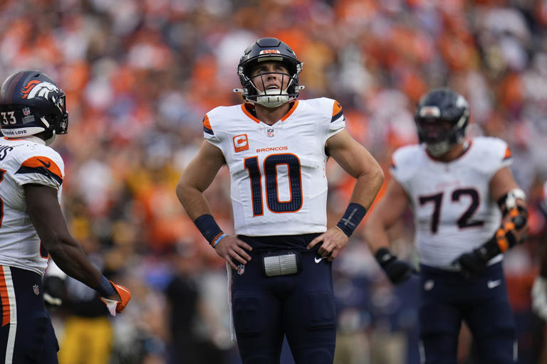 Denver Broncos quarterback Bo Nix (10) reacts during the second half of an NFL football game against the Pittsburgh Steelers, Sunday, Sept. 15, 2024, in Denver. (AP Photo/Jack Dempsey)