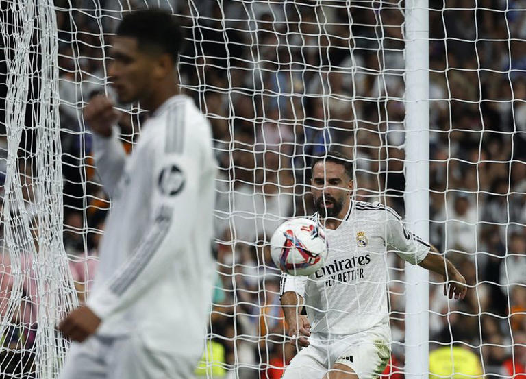 Soccer Football - LaLiga - Real Madrid v Espanyol - Santiago Bernabeu, Madrid, Spain - September 21, 2024 Real Madrid's Dani Carvajal celebrates scoring their first goal REUTERS/Juan Medina