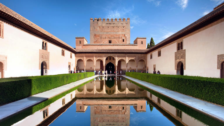 The Courtyard of the Myrtles at Granada's Alhambra features a pool lined by fragrant myrtle hedges.