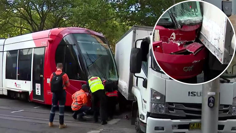 A collision between a truck and light rail tram caused headaches for motorists and public transport users in Sydney's CBD.