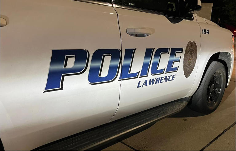 One taken into custody, another injured after 2 Lawrence collisions