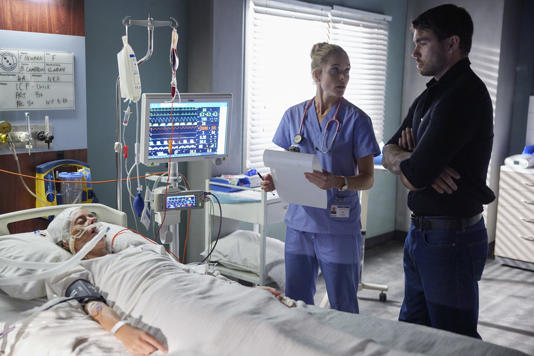 Cash refuses to switch OFF Felicity's life support machine on Home and Away... (Image credit: Endemol Shine Australia)