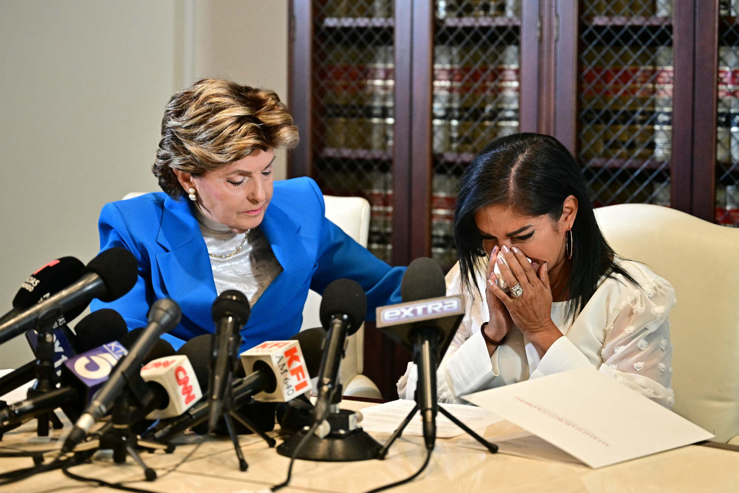 Attorney Gloria Allred (L) listens to Thalia Graves, an alleged victim of Sean "Diddy" Combs, during a press conference in Los Angeles on September 24. Getty Images