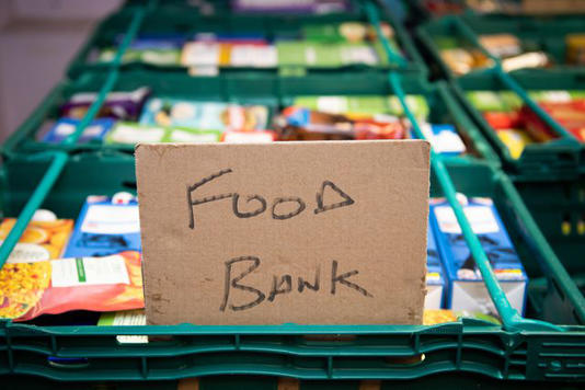 Matthew Horwood/Getty A sign at a food bank in Cardiff, Wales, on Feb. 29, 2020