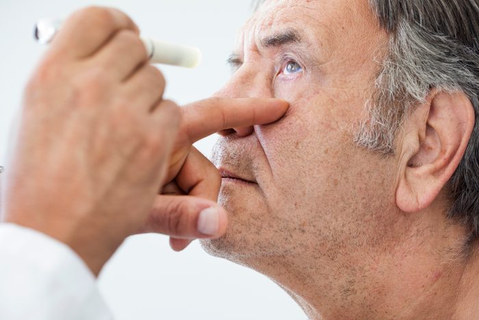 Elderly Man Examined By An Ophthalmologist