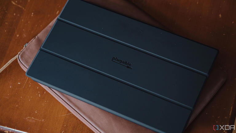 Plugable Portable USB-C Monitor sitting on laptop sleeve