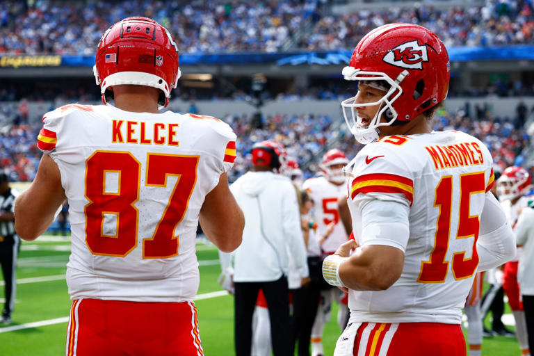 Travis Kelce #87 and Patrick Mahomes #15 of the Kansas City Chiefs on the field during the first half against the Los Angeles Chargers at SoFi Stadium on September 29, 2024 in Inglewood, California