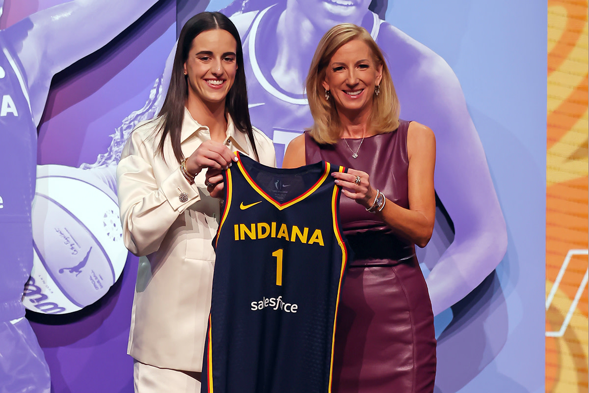 Caitlin Clark poses with WNBA commissioner Cathy Engelbert. Brad Penner-Imagn Images
