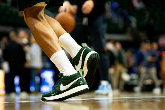 Phoenixs Devin Booker (1) plays in the Michigan State Nike Book 1 during a NBA preseason game between the Phoenix Suns and Detroit Pistons at the Breslin Center in East Lansing, Michigan, on Tuesday, Oct. 8, 2024.