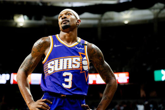 Phoenix guard Bradley Beal (3) walks down court during a NBA preseason game between the Phoenix Suns and Detroit Pistons at the Breslin Center in East Lansing, Michigan, on Tuesday, Oct. 8, 2024.