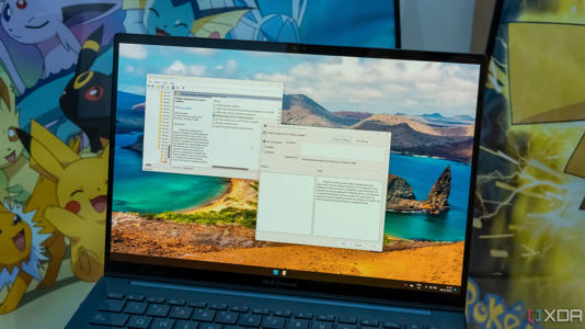 A Windows 11 laptop running Group Policy Editor