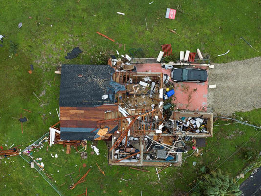 A drone view shows a house destroyed by a tornado as Hurricane Milton approaches Fort Myers, Fla., Oct. 9, 2024.