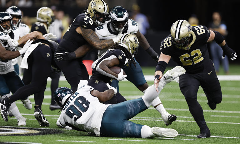 Jalen Carter stops Saints running back Alvin Kamara on Sunday, one of his four tackles in the game.