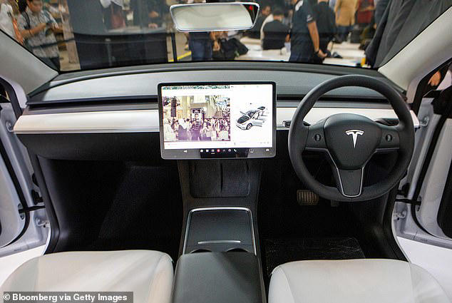 Tesla are one of the main manufacturers that continue to have full controls through the touchscreen interface, which experts have said are a 'major distraction'