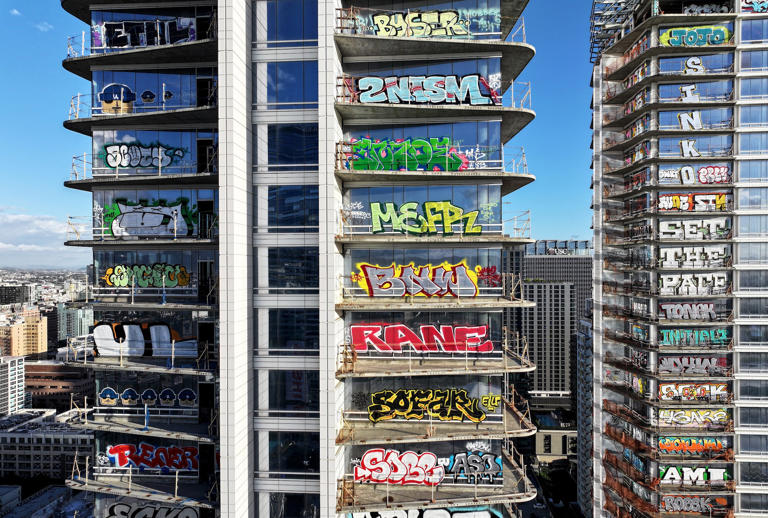 Tags on the Hollywood Hills properties bear a striking resemblance to graffiti on the Oceanwide Plaza towers, a complex abandoned in downtown Los Angeles since its developer ran out of funds. Mario Tama/Getty Images