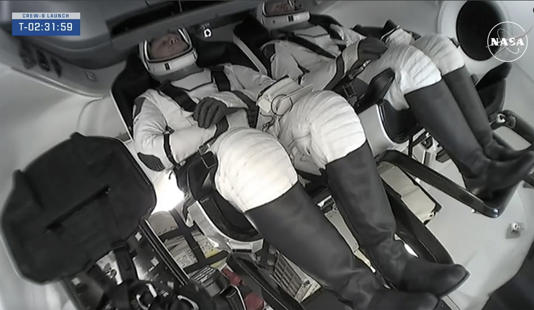 This image provided by NASA shows NASA astronaut Nick Hague and Roscosmos astronaut Aleksandr Gorbunov inside the SpaceX capsule, September 28, 2024 [NASA via AP]