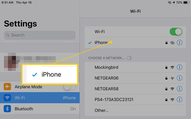 An iPhone selected in the Wi-Fi section of the iPad Settings app