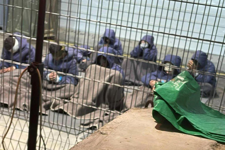 This undated photo from winter 2023 provided by Breaking The Silence shows Palestinian prisoners captured in the Gaza Strip by Israeli forces at a detention facility on the Sde Teiman military base in southern Israel. (Breaking The Silence/The Associated Press)