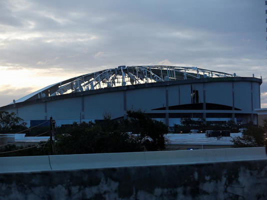 View of the damaged roof of Tropicana Field stadium, the home of Major League Baseball's Tampa Bay Rays, after Hurricane Milton made landfall, in downtown St. Petersburg, Fla., Oct. 10, 2024.