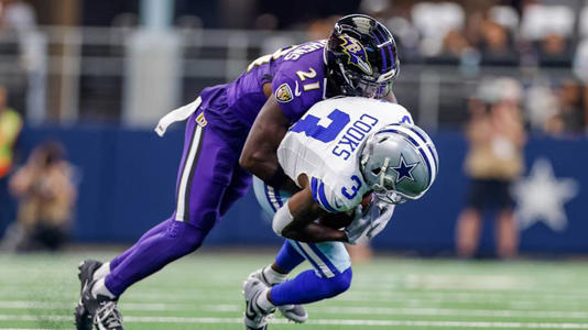 Sep 22, 2024; Arlington, Texas, USA; Dallas Cowboys wide receiver Brandin Cooks (3) is tackled after a reception by Baltimore Ravens cornerback Brandon Stephens (21) during the first quarter at AT&T Stadium. | Andrew Dieb-Imagn Images