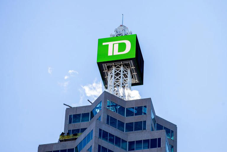 FILE PHOTO: A sign for TD Canada Trust in Toronto, Ontario, Canada December 13, 2021. REUTERS/Carlos Osorio/File Photo