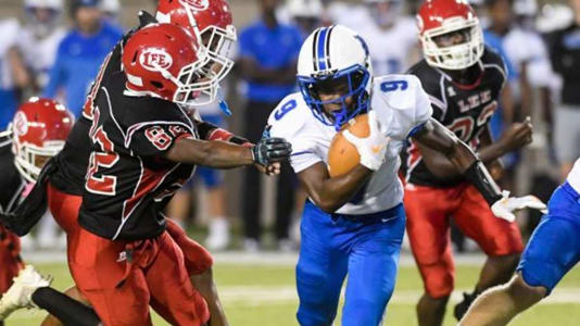 Auburn High School s Ean Nation (9) carries against Lee during their game at Cramton Bowl in Montgomery, Ala., on Thursday September 15, 2022. | Mickey Welsh / Advertiser / USA TODAY NETWORK