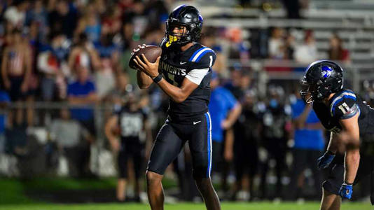 Catholic's Kingston Preyear (1) hands the ball off at Montgomery Catholic Preparatory School in Montgomery, Ala., on Friday, Sept. 20, 2024. Catholic leads Charles Henderson 28-6 at halftime. | Jake Crandall/ Advertiser / USA TODAY NETWORK via Imagn Images