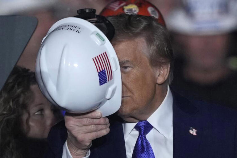 Former President Trump campaigns with steelworkers in Latrobe, Pa., on Oct. 19. ((Matt Rourke / Associated Press))