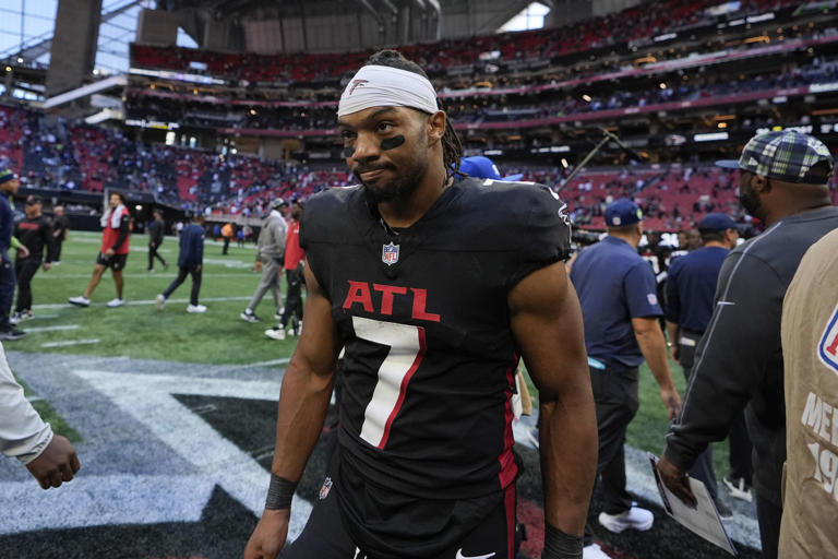 Atlanta Falcons running back Bijan Robinson (7) walks off the field after an NFL football game, Sunday, Oct. 20, 2024, in Atlanta. (AP Photo/Brynn Anderson)