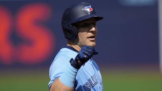 Toronto Blue Jays center fielder Daulton Varsho (25) reacts after reaching third base on a throwing error by Los Angeles Angels starting pitcher Carson Fulmer (not pictured) during the first inning at Rogers Centre in 2024. | John E. Sokolowski-Imagn Images