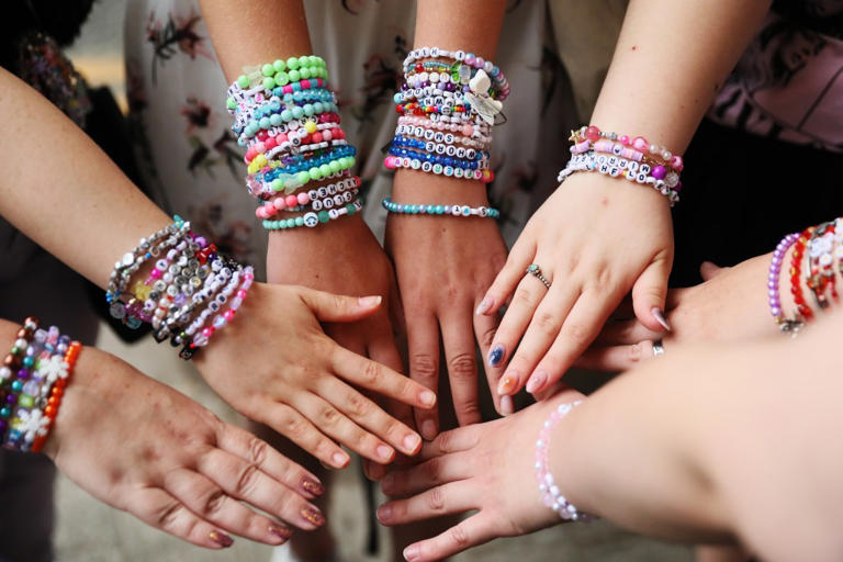 Trading friendship bracelets is an Eras Tour tradition amongst Swifties. Getty Images