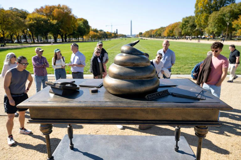 Statue of bronze poop on Nancy Pelosi's desk appears in Washington in ...