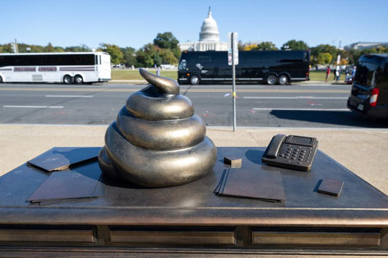 Statue of bronze poop on Nancy Pelosi's desk appears in Washington in ...