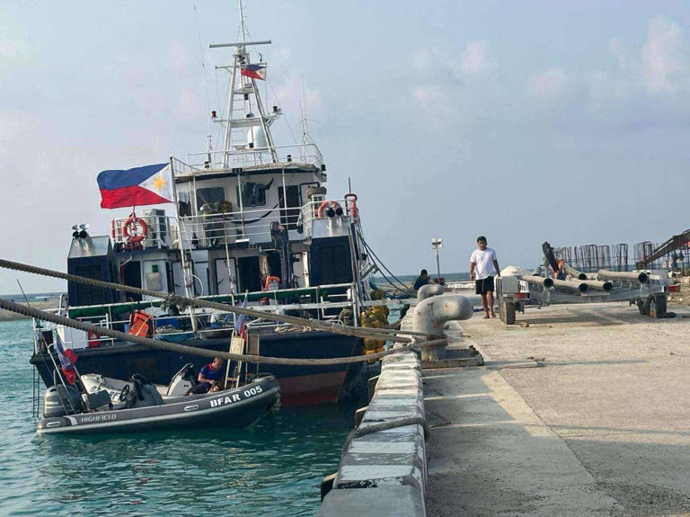 A civilian vessel docks at Thitu Island in March. Photo: Jeoffrey Maitem