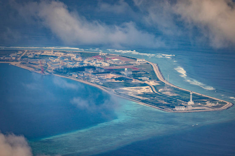 Buildings and other structures are seen in 2022 on the artificial island built by China at Subi Reef. Photo: Getty Images/TNS