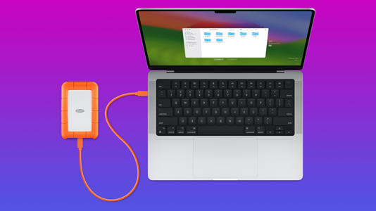 A Mac using Time Machine with an external drive against a gradient background.